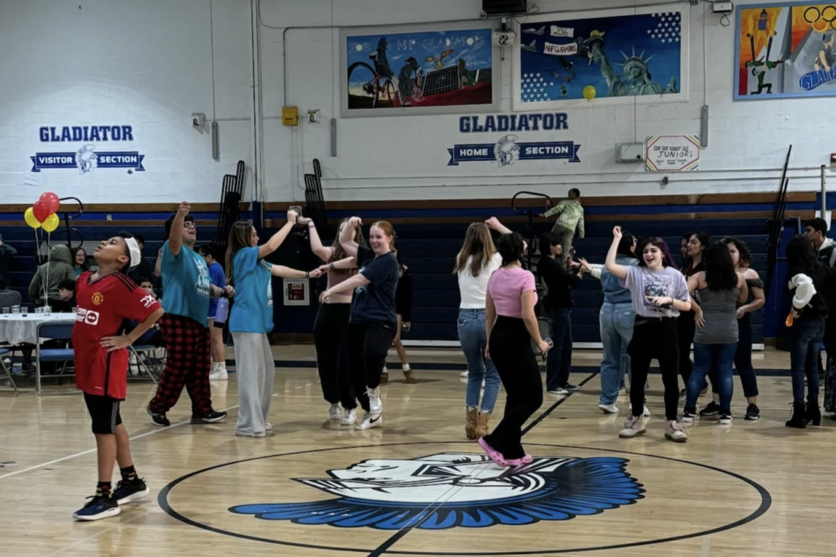 Students enjoy an evening of cultural food, music and dancing on World Language and Culture Night. (Photo source: Ms. Caliendo)

